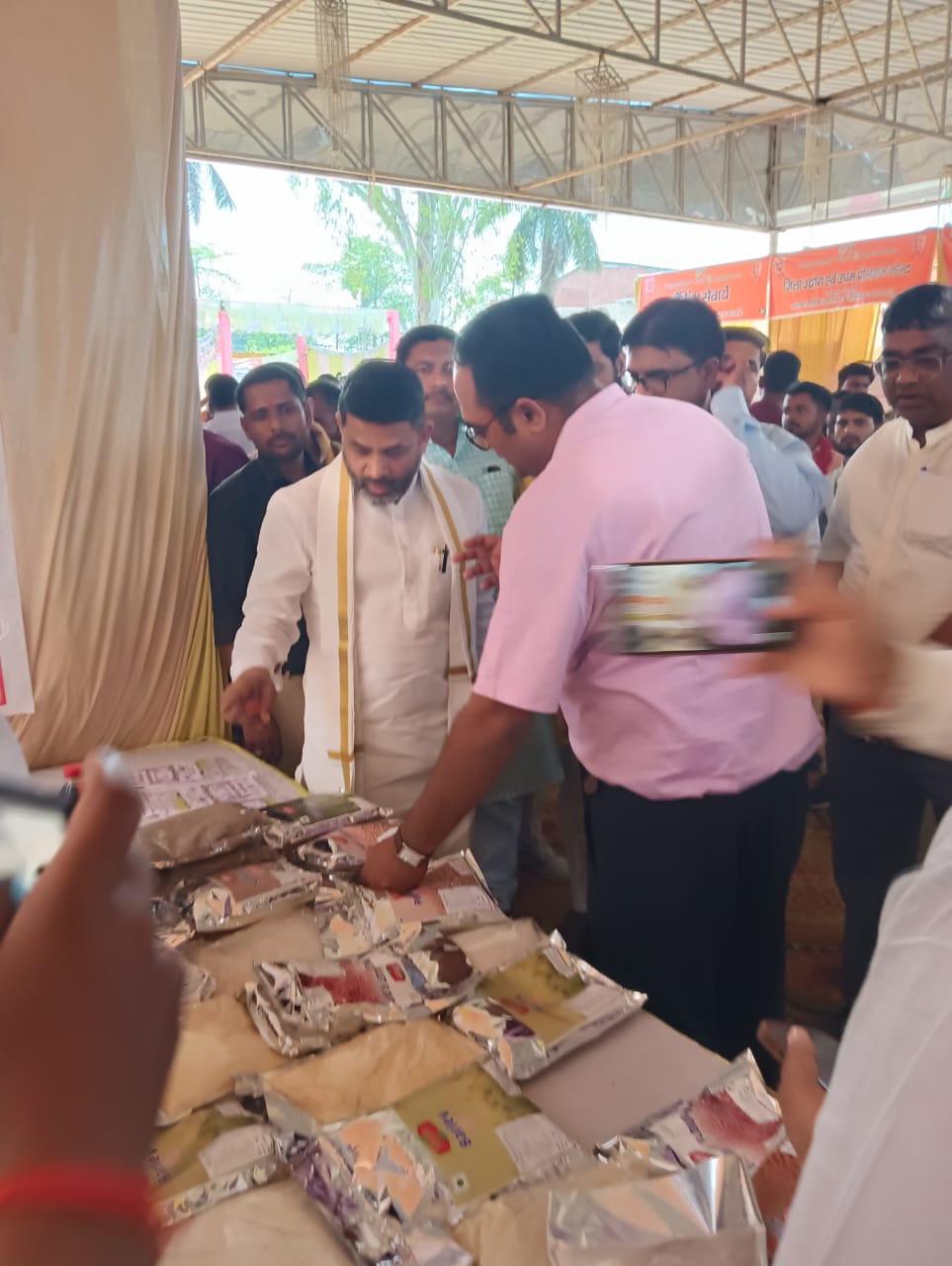 Officials browsing the Nival stall